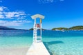 lookout pier in the crystal clear bathing area of Ã¢â¬â¹Ã¢â¬â¹Bora Bora beach in the town of Ksamil in Albania. Royalty Free Stock Photo